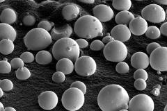 powders-of-ti6al4v-employed-in-a-laser-melting-process_8005538781_o-1